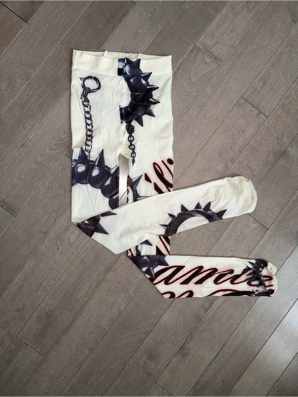 Cream Graphic Leggings with Black Spike & Chain Print